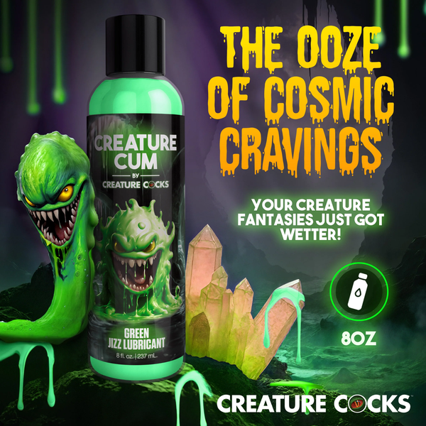 Promotional graphic titled "The Ooze Of Cosmic Cravings" set in a glowing crystal cavern, featuring the 8 fl oz bottle of green jizz lubricant alongside an animated green slime monster and an 8 oz volume badge.