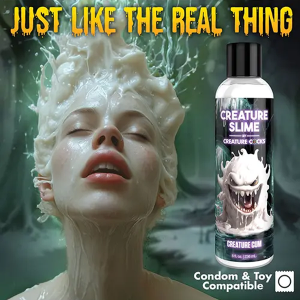 Promotional graphic titled "Just Like The Real Thing" displaying a woman covered in white liquid next to the 8 fl oz bottle, with a badge highlighting condom and toy compatibility.