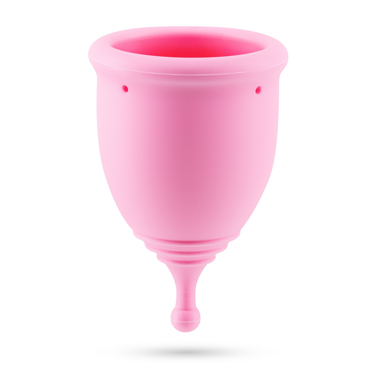A single pink menstrual cup standing upright on a white background.