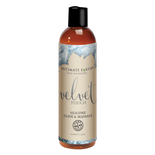 Direct studio shot of the medium 120 ml (4 fl oz) amber bottle of Intimate Earth Velvet Touch silicone glide & massage oil.