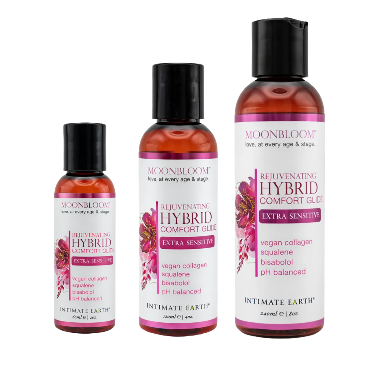 Size comparison view showing three amber bottles of Intimate Earth Moon Bloom hybrid comfort glide standing side by side in 60 ml (2 fl oz), 120 ml (4 fl oz), and 240 ml (8 fl oz) capacities. Imagen principal del producto