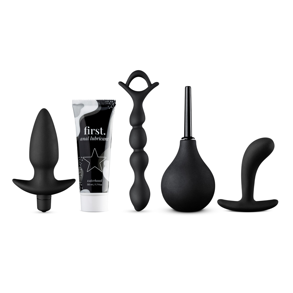 A complete set of five black products for anal play, including two different butt plugs, a beaded anal chain, a rubber douche, and a tube of water-based anal lubricant.