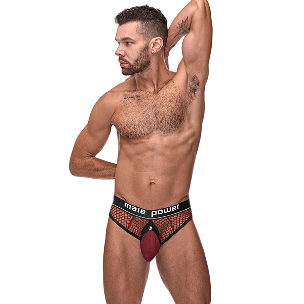 Front studio view of a male model wearing the burgundy fishnet thong with the front contoured pouch snapped closed over the C-ring opening.