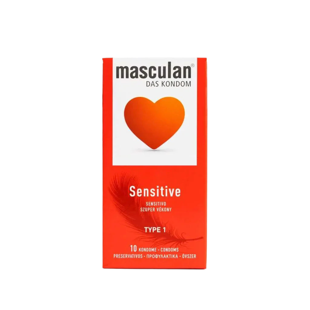 A red and white box of masculan® Sensitive condoms is shown. It features the brand name above an orange heart on a white square. Below, "Sensitive," "TYPE 1," and "10 KONDOME - CONDOMS" are printed above a feather illustration.