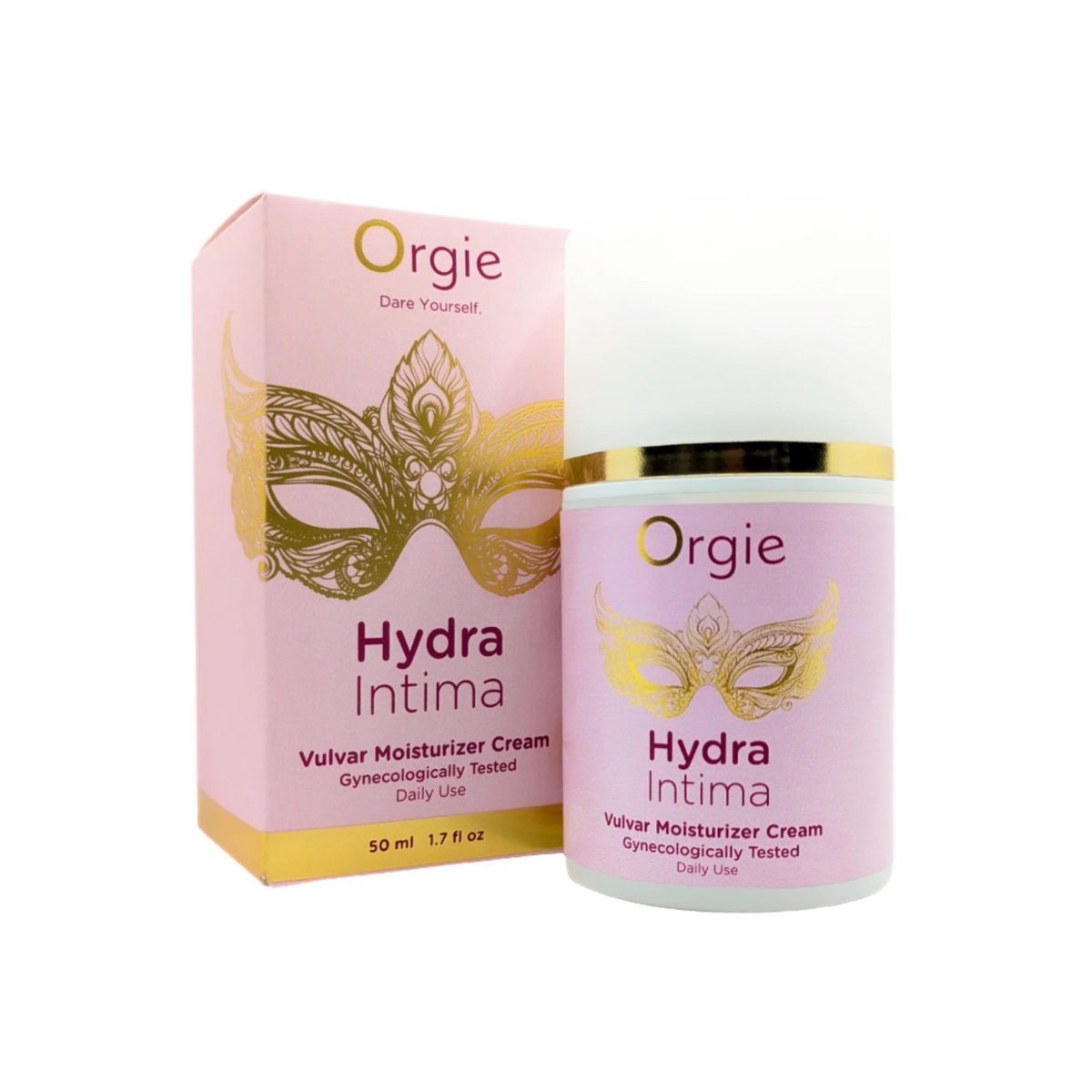 A pink box and white bottle of Orgie Hydra Intima Vulvar Moisturizer Cream. The box and bottle have gold text and a gold ornate mask illustration on them. The box specifies "50 ml 1.7 fl oz" and that the product is "Gynecologically Tested" and for "Daily Use." Imagen principal del producto