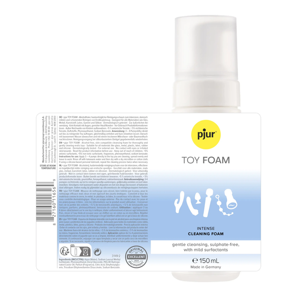 Flat-lay packaging view displaying the front and back label of the 150 ml (5 fl oz) Pjur Toy Foam bottle, showing directions, ingredients, and Dermatest certification.