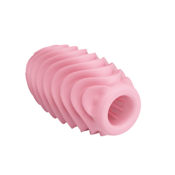 Angled studio shot of the pink wavy masturbation sleeve lying on its side, providing a view down into its ribbed internal opening.