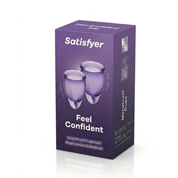 Product packaging photo showing the purple box for Satisfyer Feel Confident Menstrual Cups in Lilac, highlighting its 15-year guarantee and leak-proof claim.