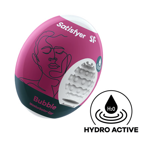 Studio product shot of the magenta and dark teal Satisfyer Bubble Masturbator Egg packaging, displaying a cutaway to the bubble-textured white inner sleeve and a circular "Hydro Active" icon below.