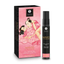 Direct studio shot of the 20 ml (0.66 fl oz) black spray bottle standing beside its pink Japanese-inspired artistic packaging box.