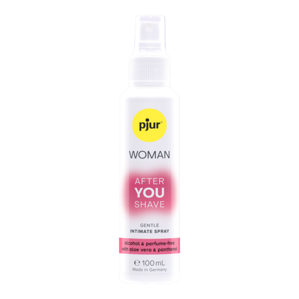 A white bottle of Pjur Woman After you shave spray with a yellow logo. Imagen principal del producto