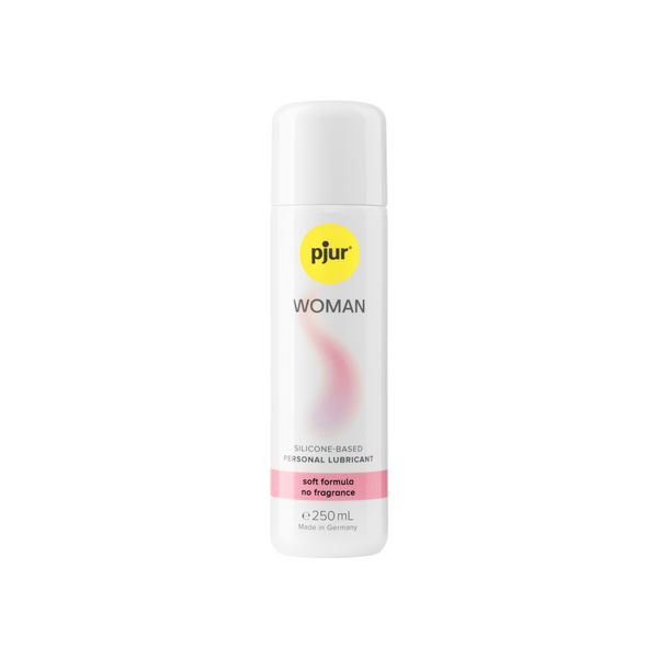 A white bottle of Pjur Woman silicone-based personal lubricant 250ml with a yellow logo and pink label indicating "soft formula no fragrance".
