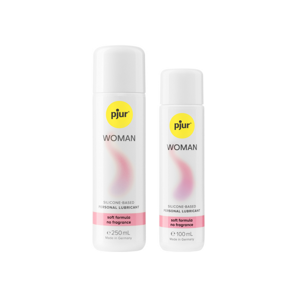 Two white bottles of Pjur Woman silicone-based personal lubricants with a yellow logo and pink label indicating "soft formula no fragrance".