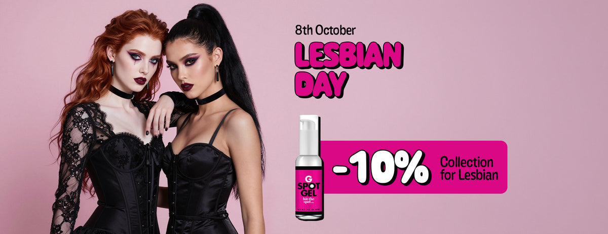 Promotional graphic titled "8th October LESBIAN DAY" set against a bright pink background, featuring two women in black lace and corset attire with dark makeup, alongside a bottle of "G SPOT GEL" and a bold pink banner advertising "-10% Collection for Lesbian".